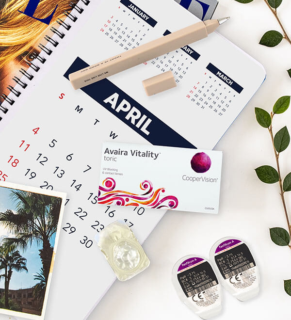 Calendar on month of April with box of Avaria Vitality lenses situated on top