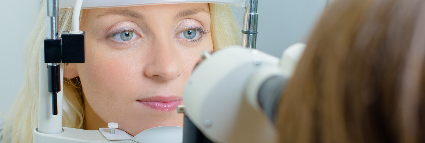 Woman having an eye test at an optician's office