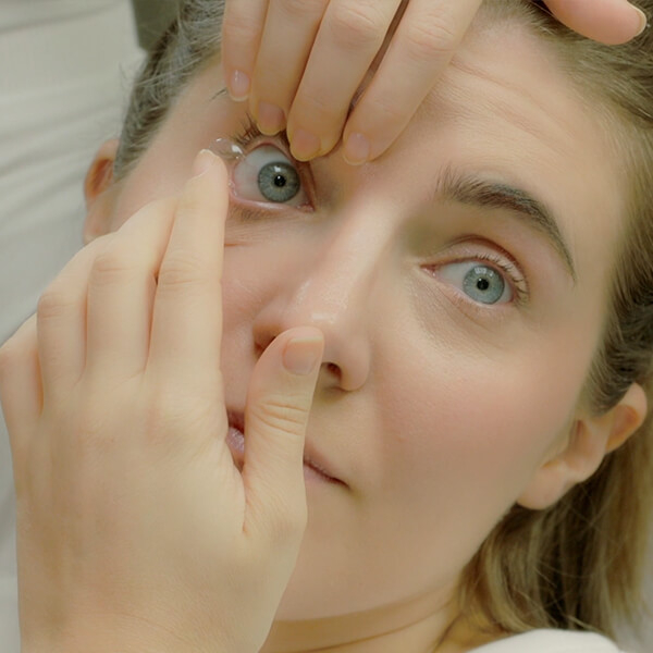 Demonstration of how to insert a contact lens